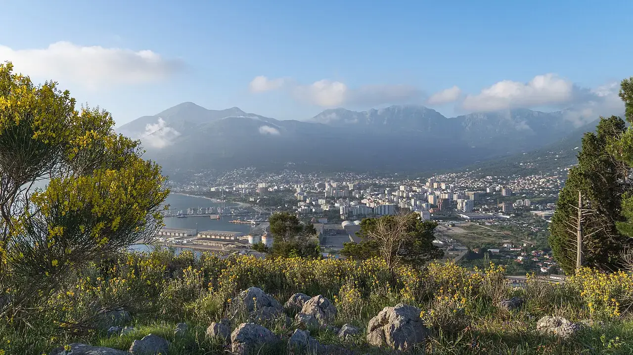 View over the town of Bar, its port and the Adriatic below Mount Rumija, seen from the Volujica headland, Montenegro